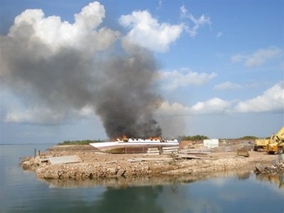 Customs burning illegals boats