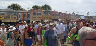 Crowds with food booths in back ground