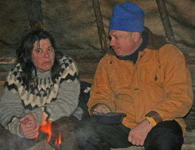 Jo&Pam conversing around the fire