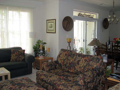 Living Room towards Dining Room and Covered Deck