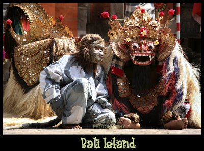 BALI, INDONESIA - OCTOBER 24: The monkey discusses with the mystical beast Barong in a staged performance at an outdoor theatre