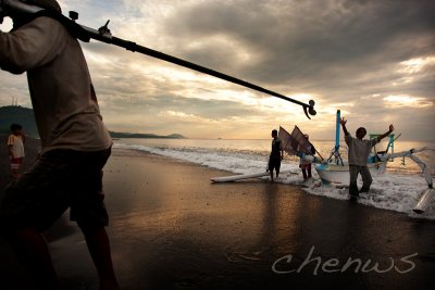 Fishermen returning from sea, Bali Island 