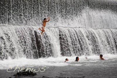 Kids enjoying a swim from the spillway  of a dam _CWS7235.jpg