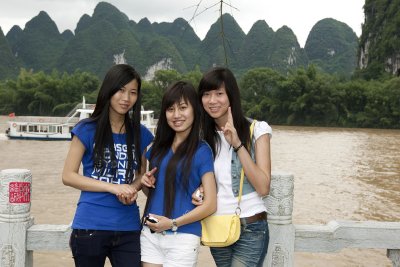 Young girls visiting Xing Ping on the Li Jiang River.
