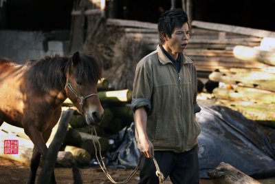 Farmer and horse, Long Ji, China.