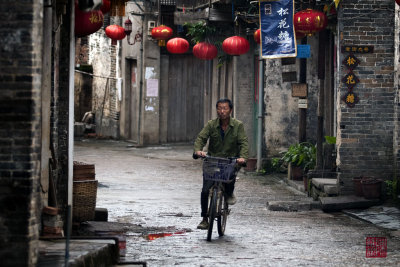 Cyclist in the morning, Xing Ping, China