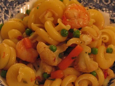 Trottole prepared with prawn, bean and carrot
