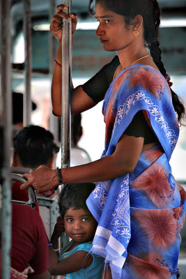 Safe under mother's sari