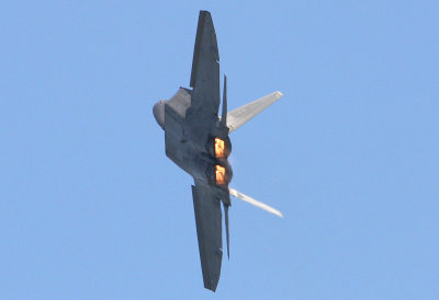 F-22 Raptor with afterburners ablaze.