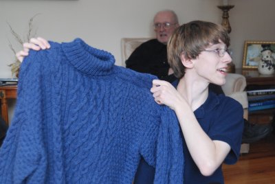 Alex Opening His Sweater