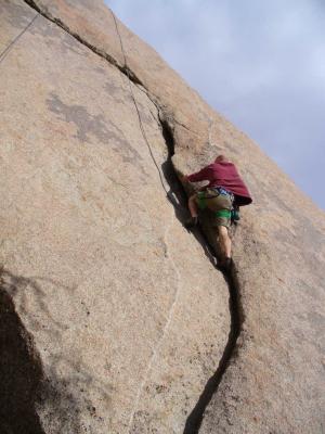 Tom scampering up Jan's Crack