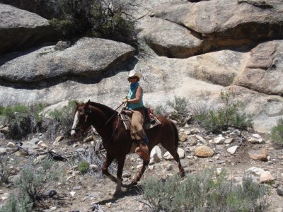 Mojave & J stepping out in front of the rocks