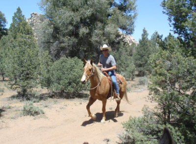 Jim and Hollywood loping down the trail