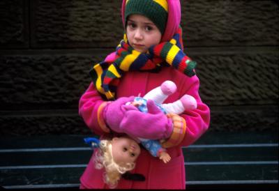 girl and doll in the street.jpg