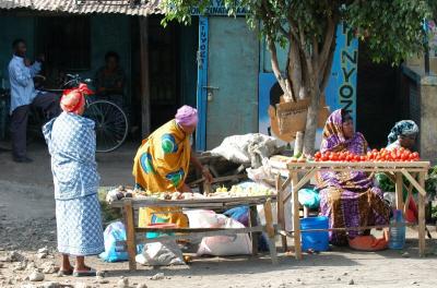 women selling vegetables at street market
