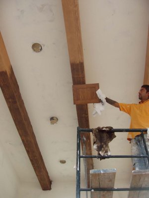 Beams are stained to match the cabinets