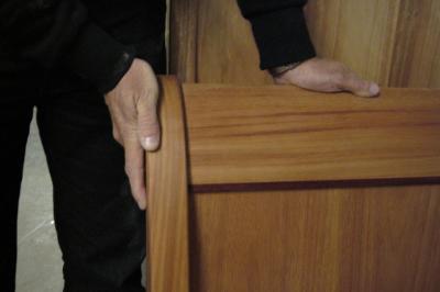 Detail of master bedroom sleigh bed