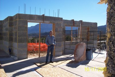 Jim by the front door (with boulder in place!)