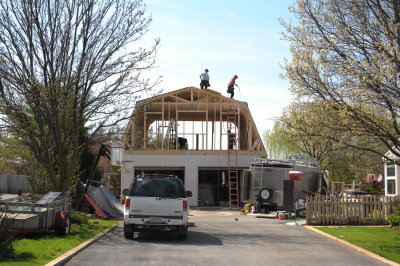Like in the movie Witness, the cooperative way to build a house.