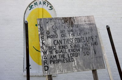 Sign in front of closed church