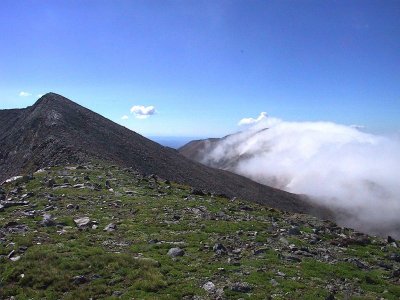 Cloud Engulfed Red Mtn, on the Right, Summit of Culebra on Left