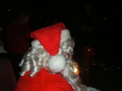 Santa in thought, checking his list.