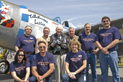 Flying Heritage Collection staff and volunteers with Col. Jenkins