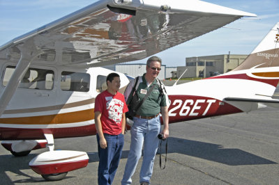 Kevin Kelly, Director of The Aviation Academy, with graduate Brian Lopez.