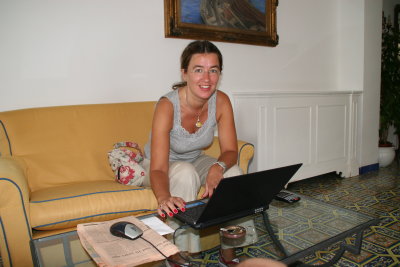 checking e-mails at hotel lobby