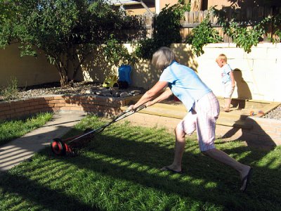 Baba mowing; Simon playing