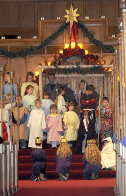 Christmas Eve pageant (Simon is the cow in red tie)