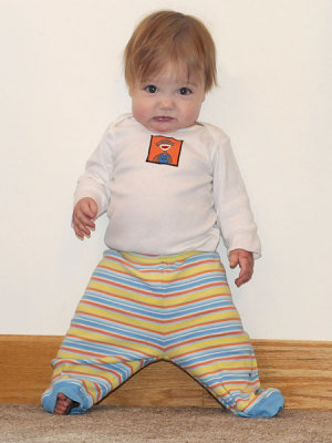 Kristina practices standing (leaning)