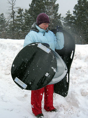 Dana carries everyone else's sleds