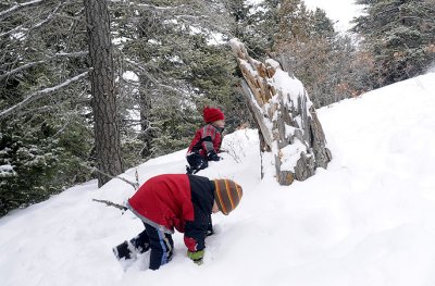 It's hard work to climb a sledding hill