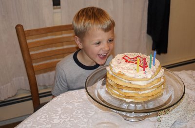 Birthday boy with his strawberry torte