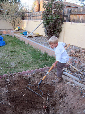 Simon helps in the garden