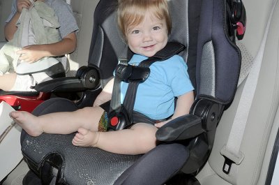 Kristina tries out her new 1-yr-old carseat