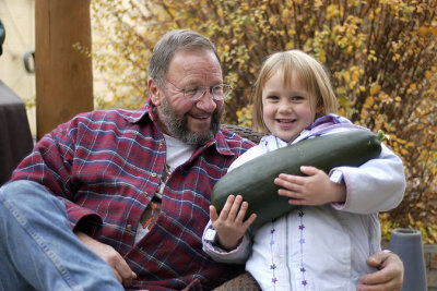 Granddaddy and Maeve, with zucchini