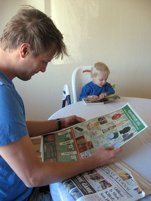 He and Daddy catch up on the news