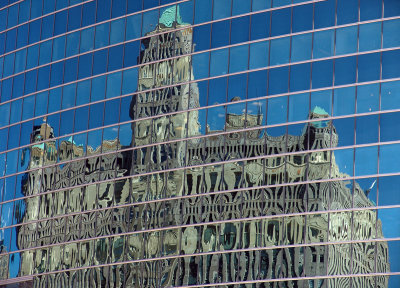 The Merchandise Mart reflected in the windows of 333 Wacker Drive
