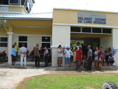 Flight arrival is a sort of social gathering for the Kelabits and Penans as well though they tend to keep away from the crowd.