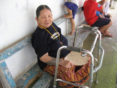 A Kelabit Lady in the Penghulu's Longhouse.