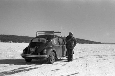 Old VW parked on frozen Wisconsin lake, early 70's