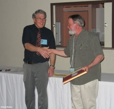 The Conservation Award, Non-member, presented to Ken McRae (R)