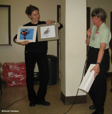 Annie displaying two of Diane's photos