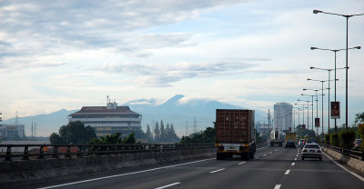 The mountains as seen from a toll road in Jakarta