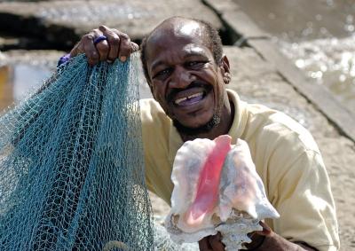 15. St Lucian man with net & shell.