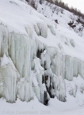 details of the frozen melting water along the road east of Utsjoki
