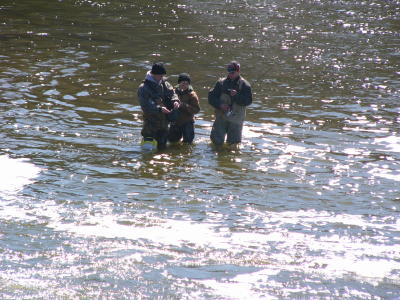 Fisherpeople in River