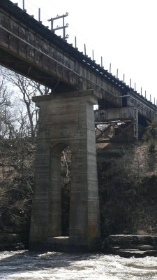 High bridge below falls